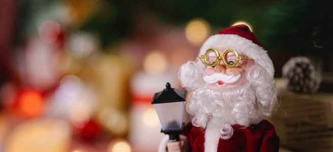 santa claus toy in glasses